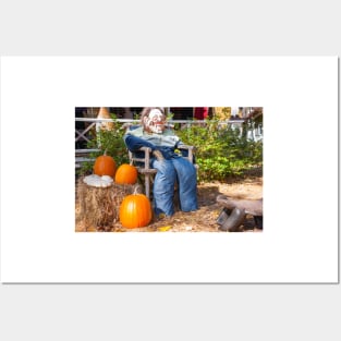 Halloween Mannequin in with ugly mask chair outside beside three large orange pumpkins Posters and Art